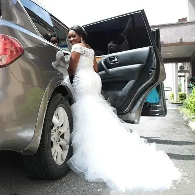 

Customized African Nigeria Mermaid Wedding Dresses Off Shoulder Crystal Beaded Tiered Ruffles Court Train Custom Plus Size Forma
