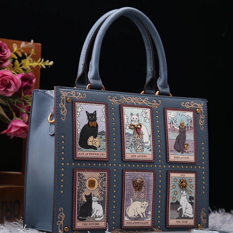 

Vintage and Luxury Designer Bags with Delicate Cartoon Cat Printing and Embroidery Rivet Design Popular and Retro Tote Bag