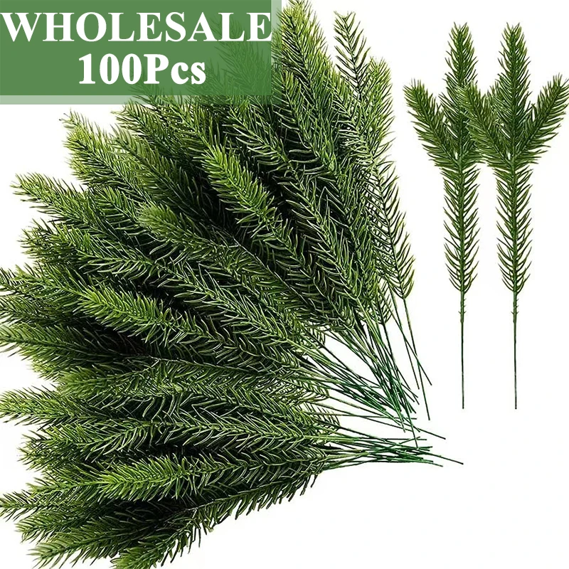 

Wholesale 100pcs Christmas Tree Pine Branches Artificial Fake Plants Wedding Home Living Room Decorations DIY Xmas Gift Ornament