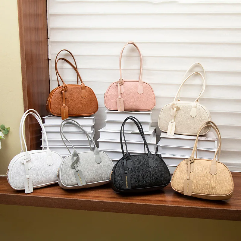 

Корейская версия, нишевая дизайнерская сумка с узором личи, новинка 2025 года, повседневная универсальная сумка через плечо для боулинга, роскошные дизайнерские сумки