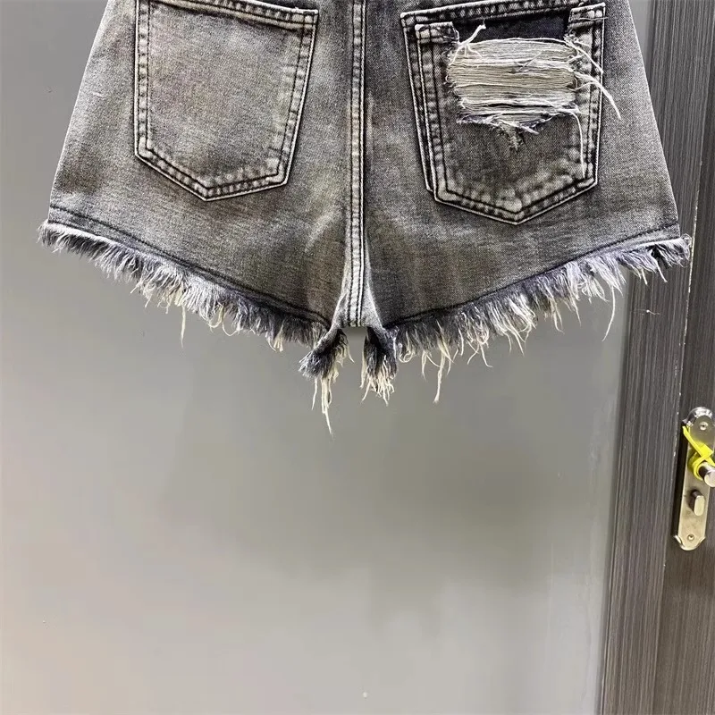 Worn Legs with Rough Edges Washed Black Denim Shorts 2026 Summer New Women Fashion A-line Wide Leg Hole Ripped Denim Shorts
