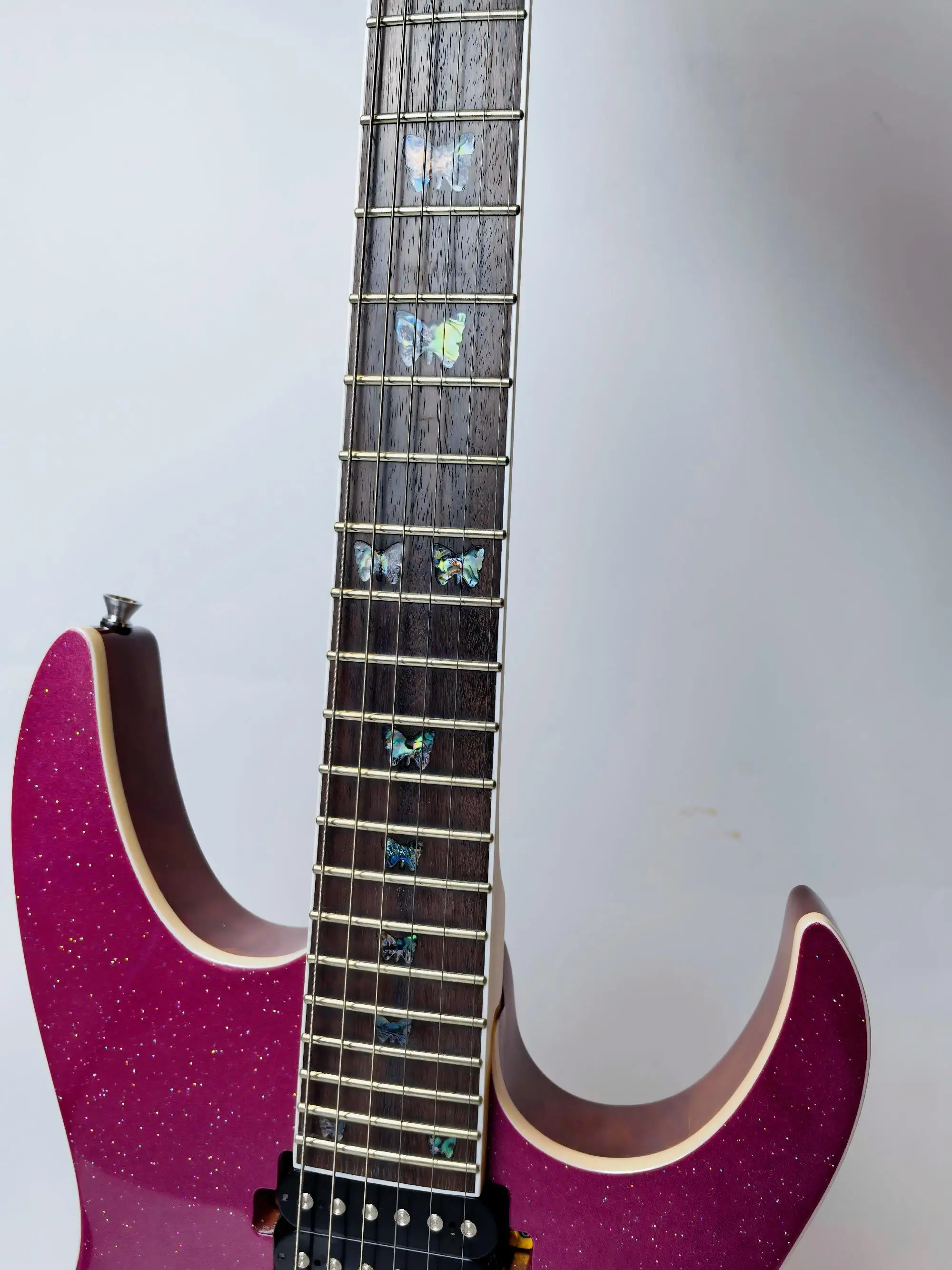 Customizable, in stock, large purple particles 24 cents electric guitar, Augustan body, plus maple head.