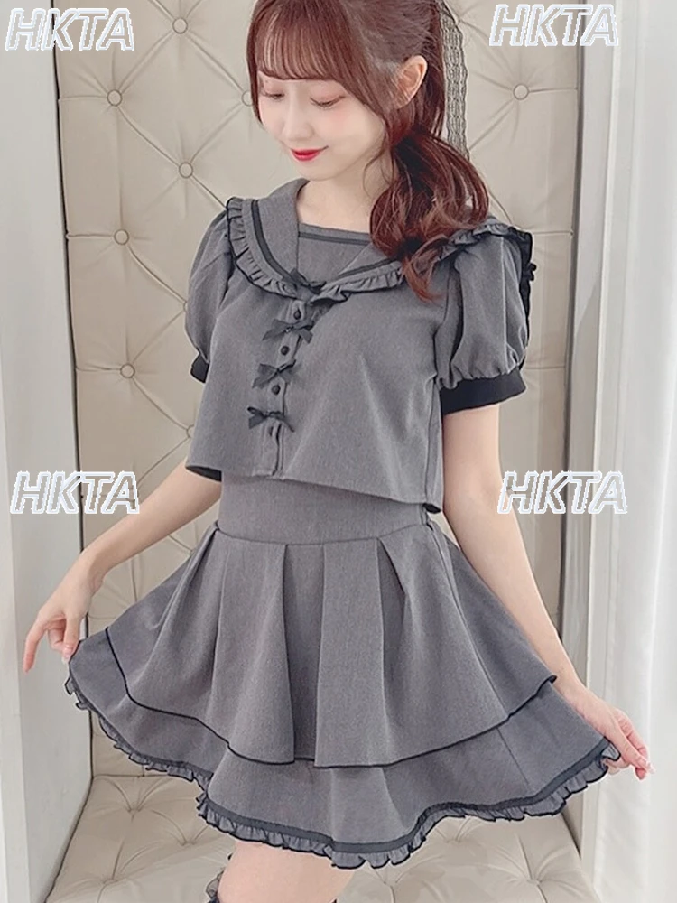 

Японский стиль, консервативный сладкий маленький бант, кружевной темно-синий воротник, рубашка с короткими рукавами, топ + плиссированная юбка с эластичной резинкой на талии, женский комплект