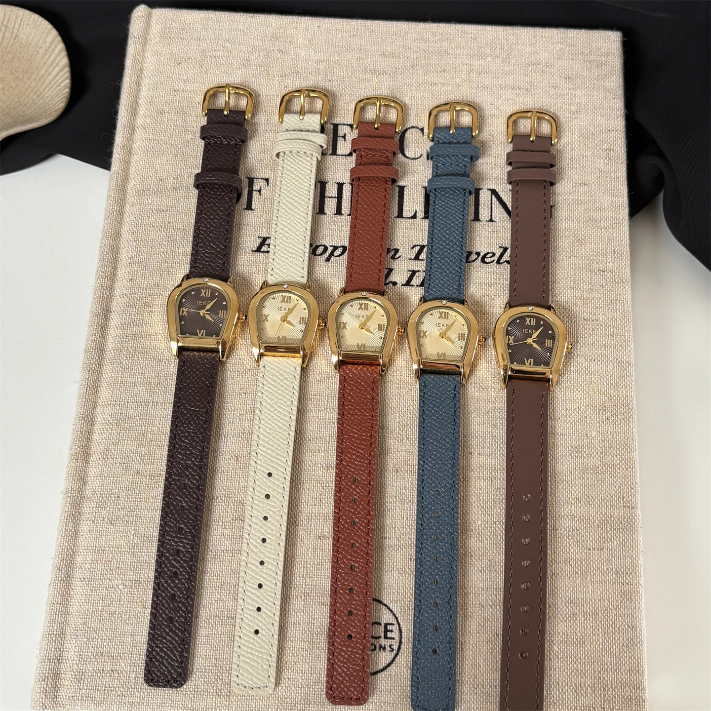 Retro temperament, niche, exquisite arch shaped watch, women's white display, commuting, workplace, leisure watch