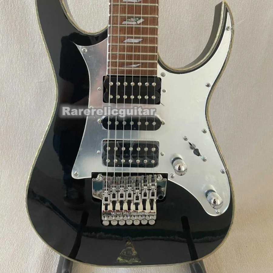 Hot Selling UV777 7-string Black Electric Guitar,double-locking Tremolo Bridge, Pyramid Inlays, Abalone Sunburst Top,HSH Pickups