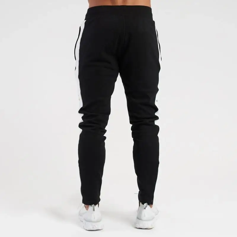 Calça esportiva com emenda de elásticos micro masculina, marca da moda, monocromática, nova moda casual, primavera e outono, 2023