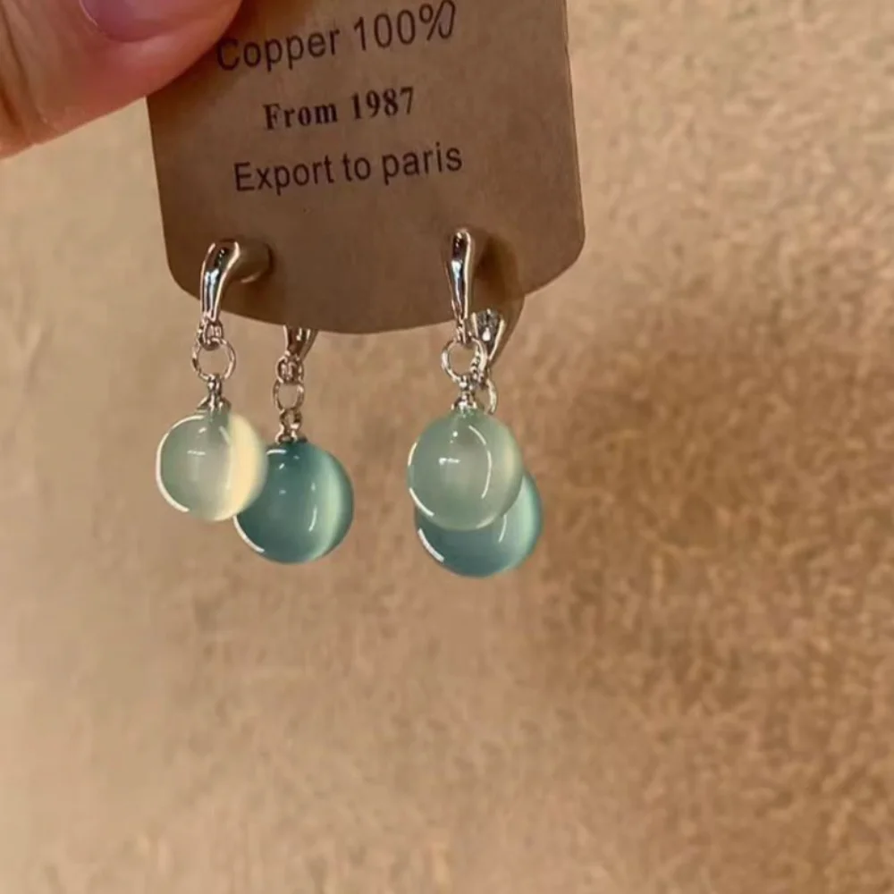 2025 جديد الحلو خمر السيلينيت الفيروز إسقاط أقراط الأبيض زنبق الوادي زهرة أقراط أقراط أنيقة ولطيفة