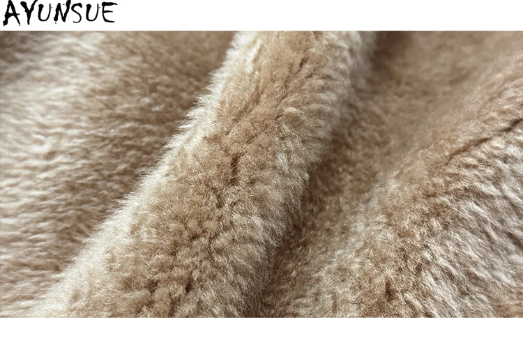 เสื้อแจ็คเก็ตหนังแท้ AYUNSUE สำหรับผู้หญิง เสื้อโค้ทขนแกะเมอริโน ขนสัตว์แท้ธรรมชาติ เสื้อโค้ทขนสัตว์อุ่นๆ สำหรับฤดูหนาว ผู้หญิง 2025