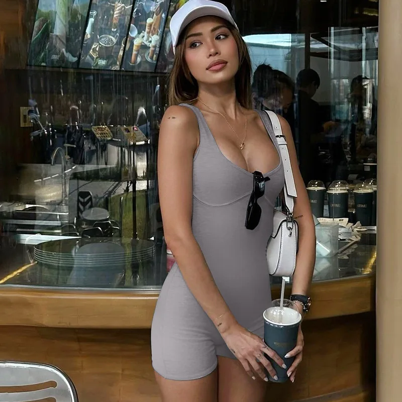 

New autumn collection of European and American women's clothing: solid color slim-fit U-neck shoulder strap jumpsuits