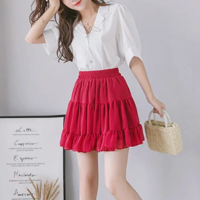 تنانير صيفية للطلاب بلون الحلوى على طراز بريبي مقاس كبير تنانير نسائية مثيرة صغيرة من الشيفون مرقعة بطيات