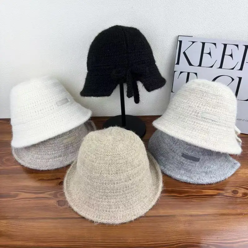 

2025 New Winter Bow Knitted Hat, Women's Versatile Warm Fisherman Hat, Fashionable and Stylish Small Ear Protection Hat