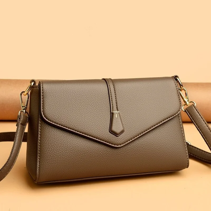 

Женская элегантная сумка-мессенджер от известного дизайнера с классическим дизайнерским парижским стилем и высококачественным кожаным материалом ​