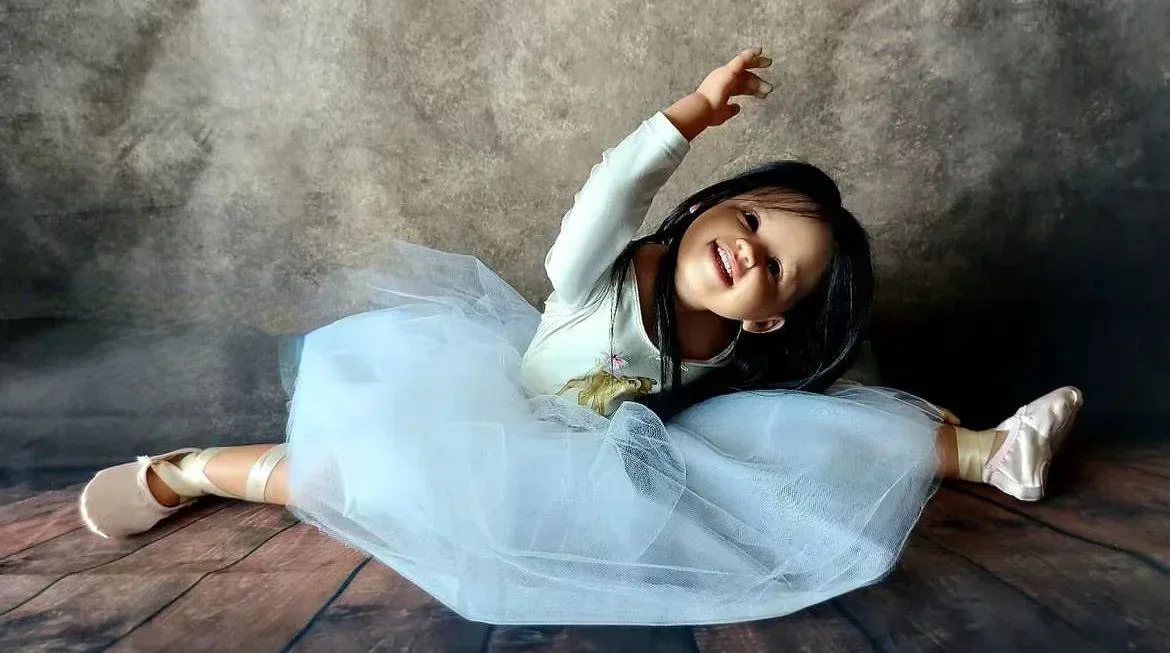 Bambola personalizzabile EGO Baby Doll Reborn da 29 pollici Shanti con lunghi capelli neri Bambola già finita con abito diverso