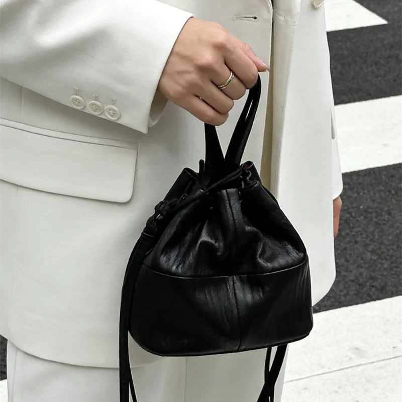 Black sheepskin bucket bag with drawstring and pleated bag Leather Handle crossbody bag Super soft leather