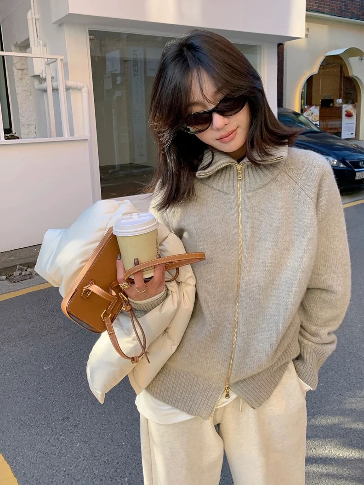 Outono e inverno novo suéter de caxemira com zíper feminino cardigan lapela suéter casaco vento preguiçoso solto.