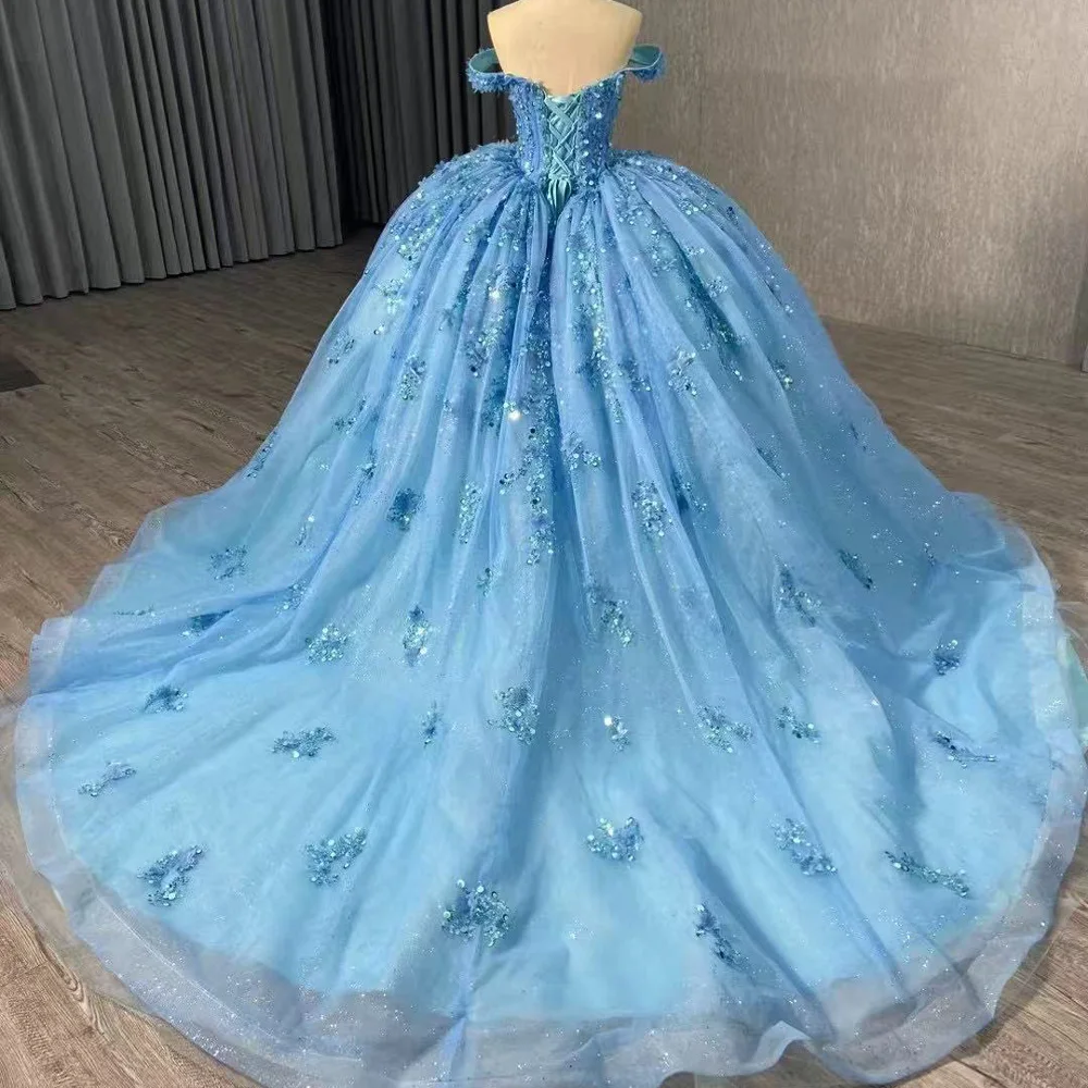 فستان طويل فاخر من Vestidos De 15 بدون أكتاف على شكل قلب مزين بالترتر وأربطة من الخلف باللون الأزرق للمناسبات الخاصة