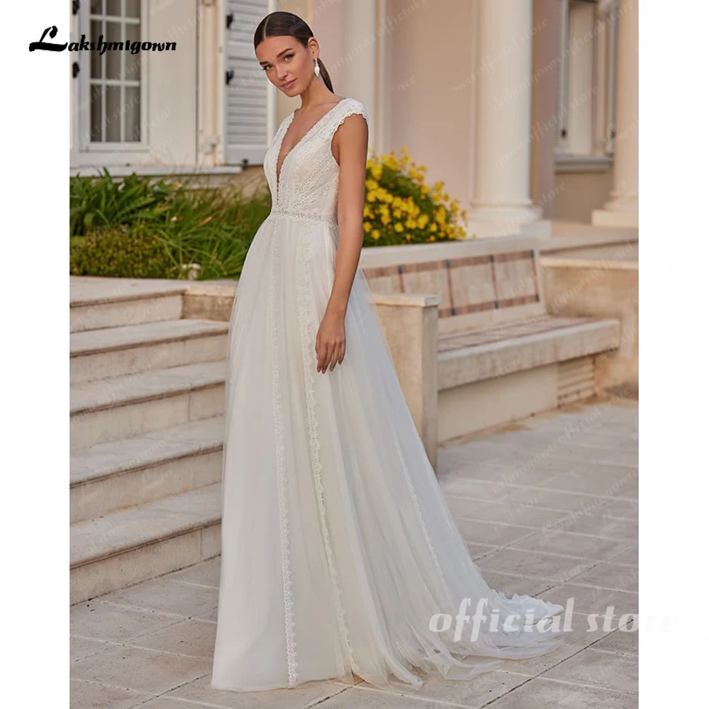 

Lakshmigown Великолепное свадебное платье в стиле бохо с v-образным вырезом 2026 Очаровательное свадебное платье трапециевидной формы с глубоким V-образным вырезом на спине Vestidos De Novia по индивидуальному заказу