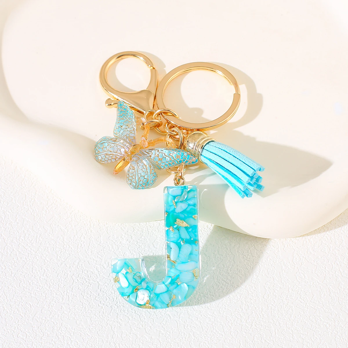 السماء الزرقاء الأبجدية رسالة المفاتيح مع فراشة هامش الراتنج حجر الأولي كيرينغ للنساء الإناث فتاة حقيبة الظهر قلادة M S