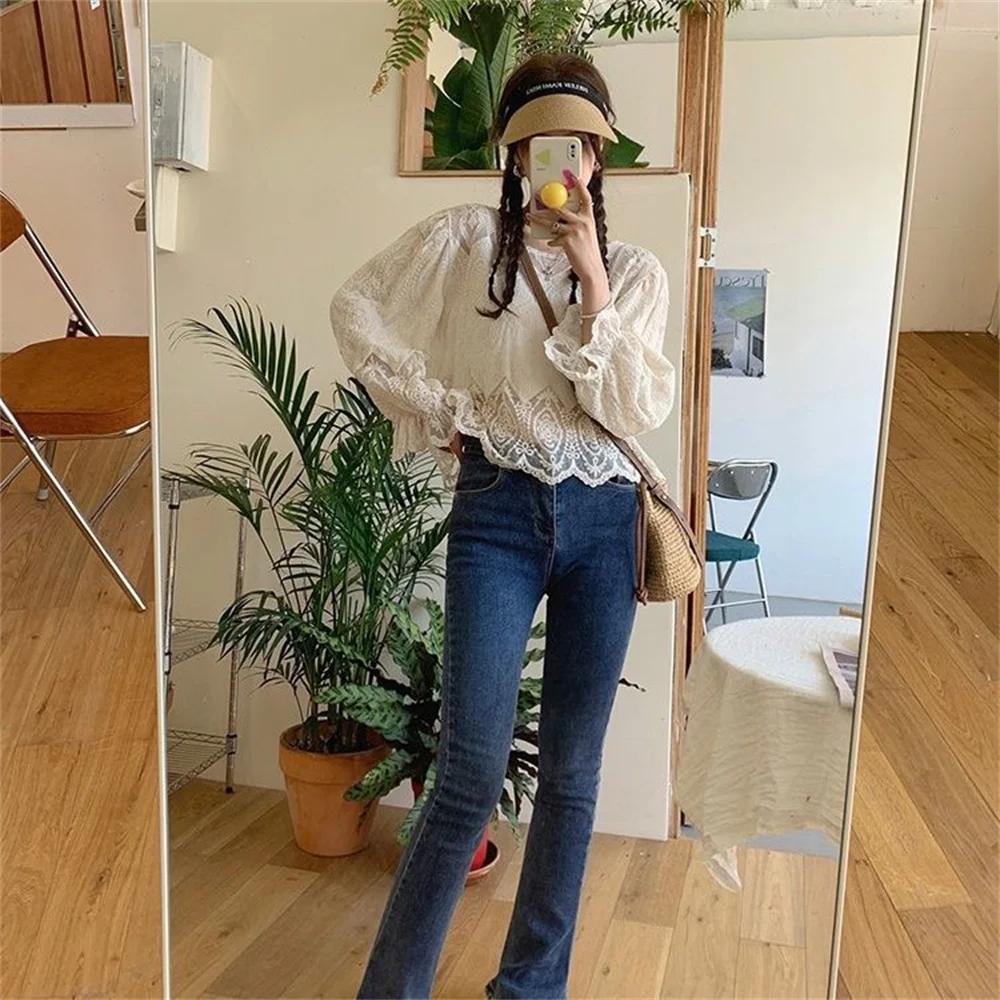 Camicetta estiva stile francese Top da donna all'uncinetto 2025 Nuovo scava fuori manica lunga O-Collo Casual Beach coreano Top Camicie femminili