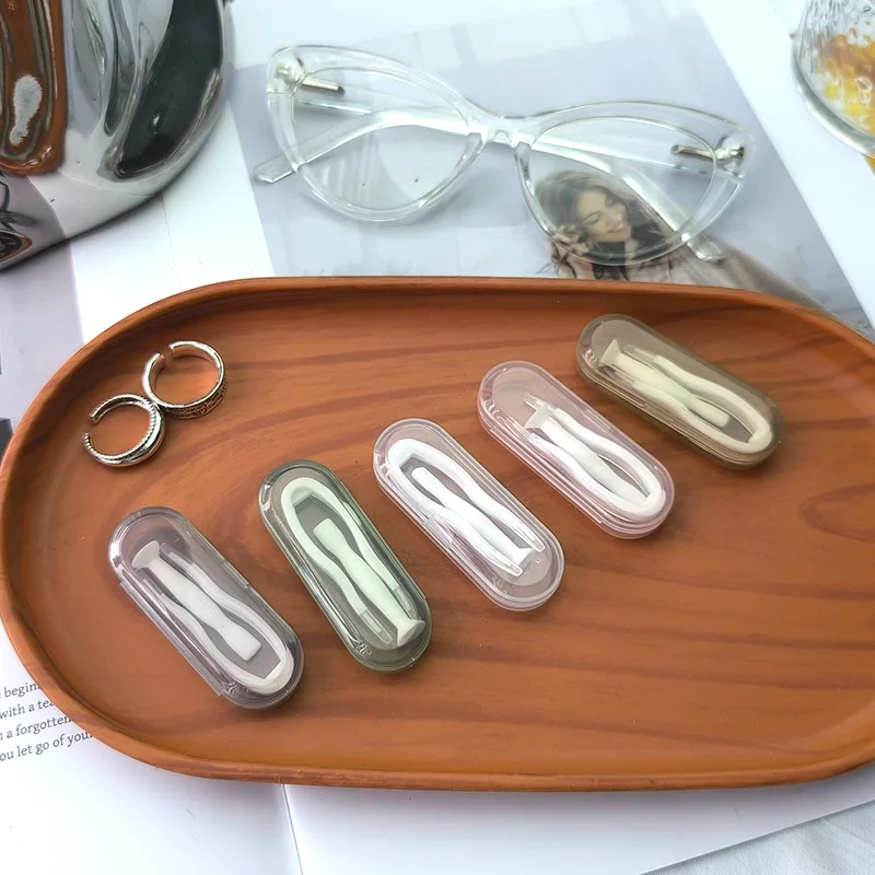 مجموعة أدوات العناية بالعين المحمولة ذات الألوان الشفافة الرجعية للرجال والنساء مع ملاقط وعصا شفط