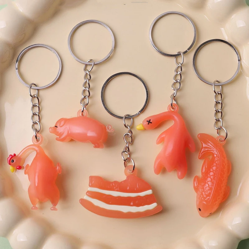 

UV Light Sensitive Color Changing Roast Duck Keychain Charms Animals Fish Pig Chicken Key Chain Car Key Ring Bag Hanging Pendant
