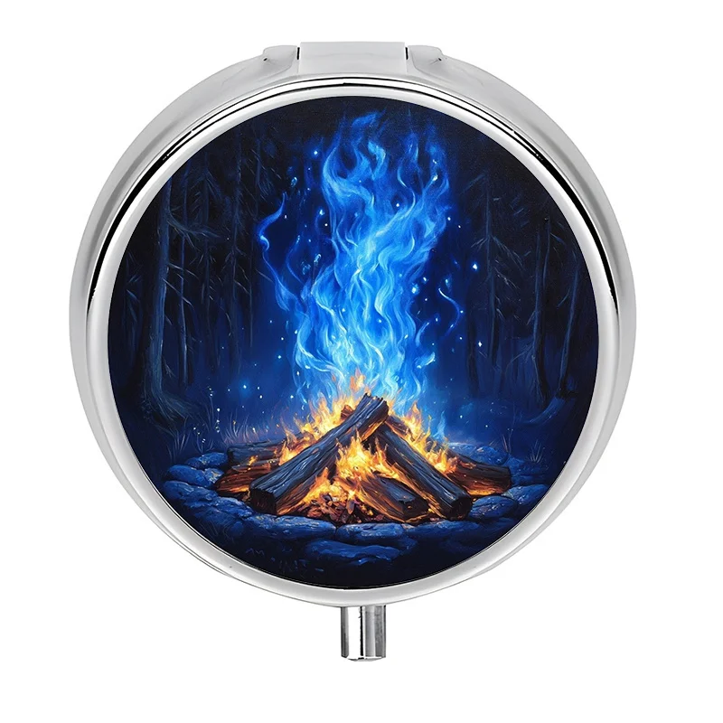 1-piece 3-compartment metal-plastic mini pill box, featuring a campfire night forest design (campfire, flames, starry sky, blue light) - Portable fire pit-themed pill organizer, suitable for travel, camping, and medication storage - Compact and durable