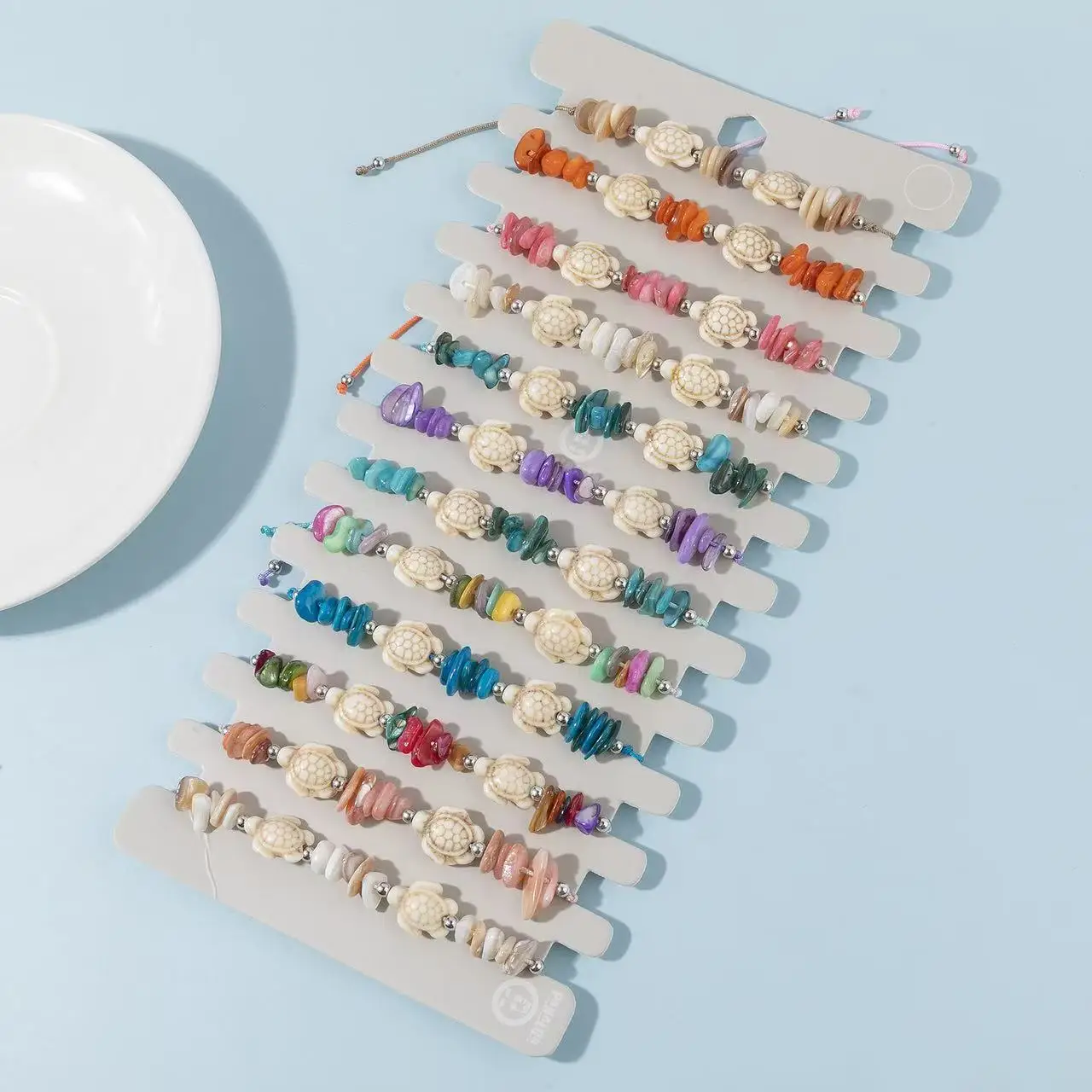 Bracciale con perline di tartaruga in pietra naturale colorata irregolare bohémien da 12 pezzi regolabile per uomini e donne