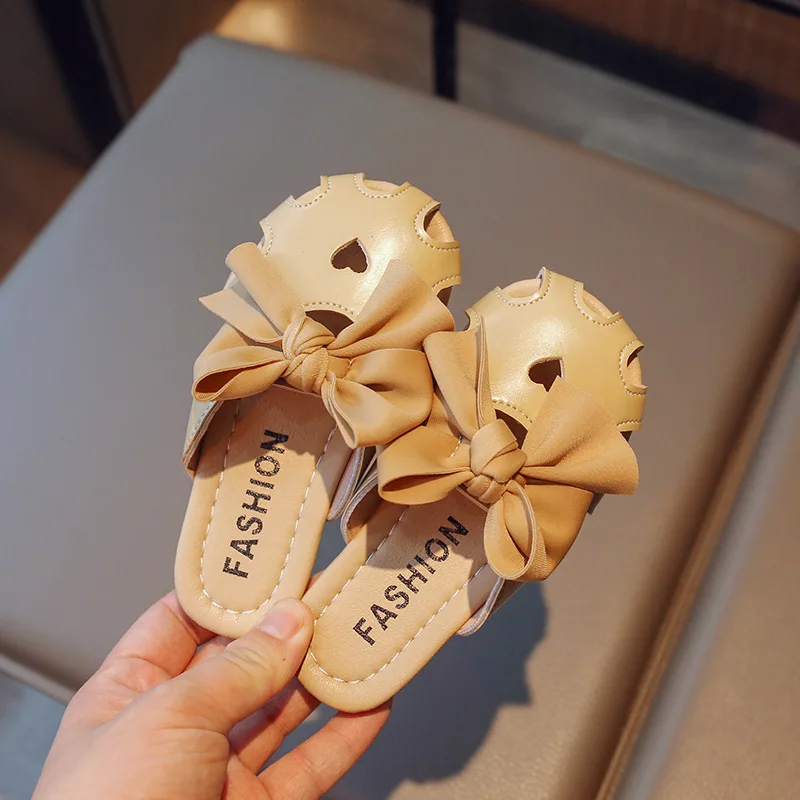 Zapatos de cuero PU con agujeros en forma de corazón para niños, zapatillas de princesa con lazo para niña, zapatillas de Color sólido, suela blanda con lazo, zapato para niño pequeño