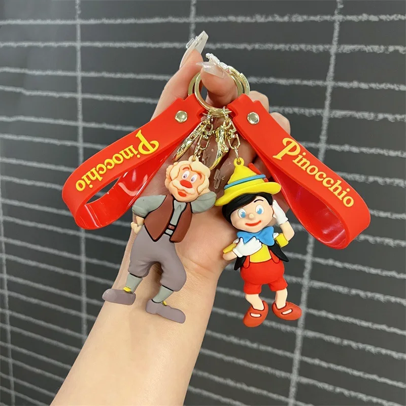 Creative Pinocchio keychain nostalgic story old carpenter lying long nose boy keychain men and women bag pendant