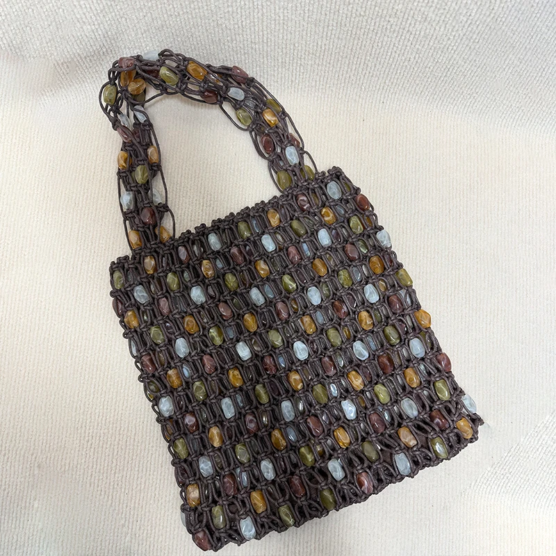 Vintage Handgefertigte Perlen-Handtasche Nischen-Designer Luxus Ausgehöhlte Bucket Bag Neue Sommer Damen Strand-Urlaubstasche – Detail 26