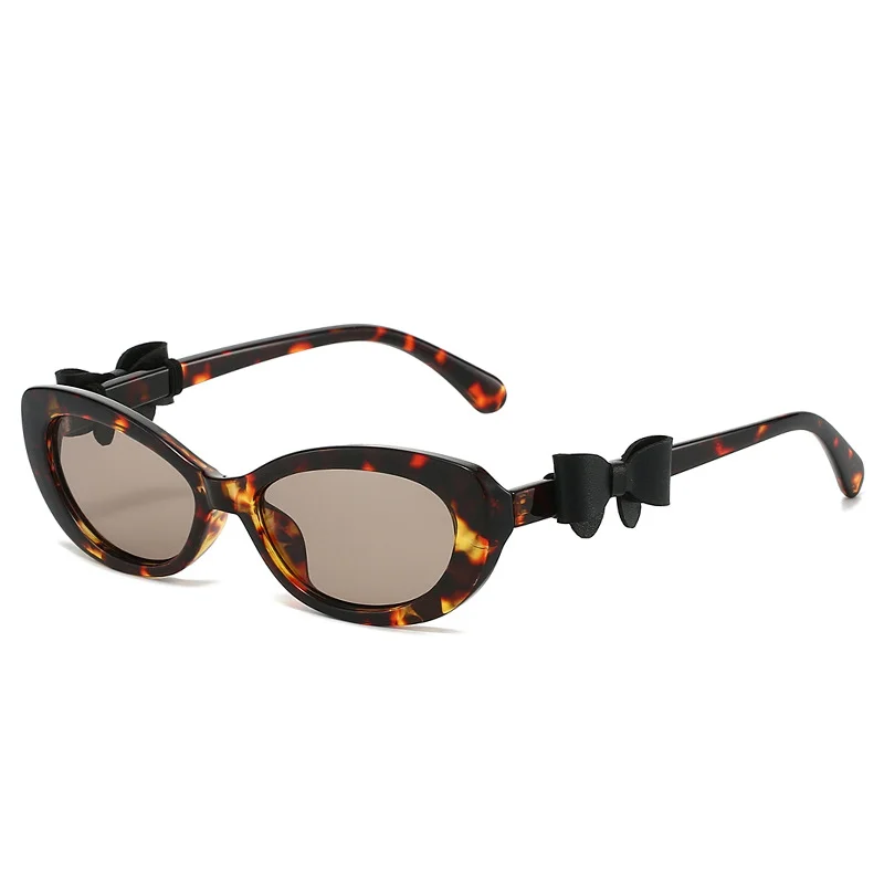 

New Leopard frame sunglasses women retro summer style cute bow sun glasses ladies fashion oval leopard frame uv400 trendy shades