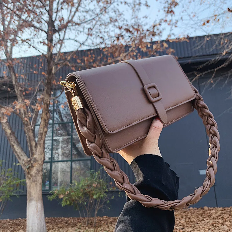 KK   2024 new handbag, women's new texture PU single shoulder crossbody bag, with a buckle armpit pocket niche design