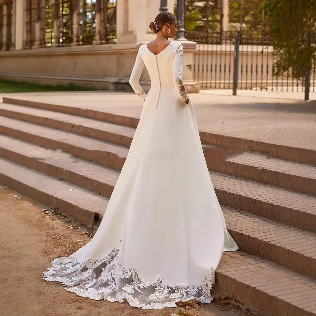 カスタマイズされたエレガントなサテンOネック長袖シンプルウェディングドレス 女性用2025 スウィープトレインブライダルガウン 花嫁衣装