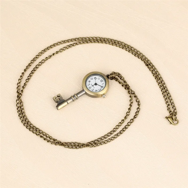 Unikatowy zegarek kieszonkowy w kształcie klucza z brązowym łańcuszkiem, mini, mechanizm kwarcowy, wyświetlacz z cyframi arabskimi, zegarek dla kobiet i mężczyzn.