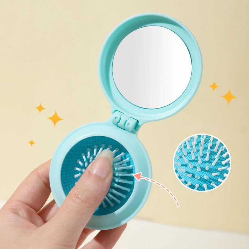 1 Stück tragbare, zusammenklappbare Haarbürste mit integriertem Spiegel, Kopfhautmassagekamm, ideal für Reisen und als Haaraccessoire. – Detail 4