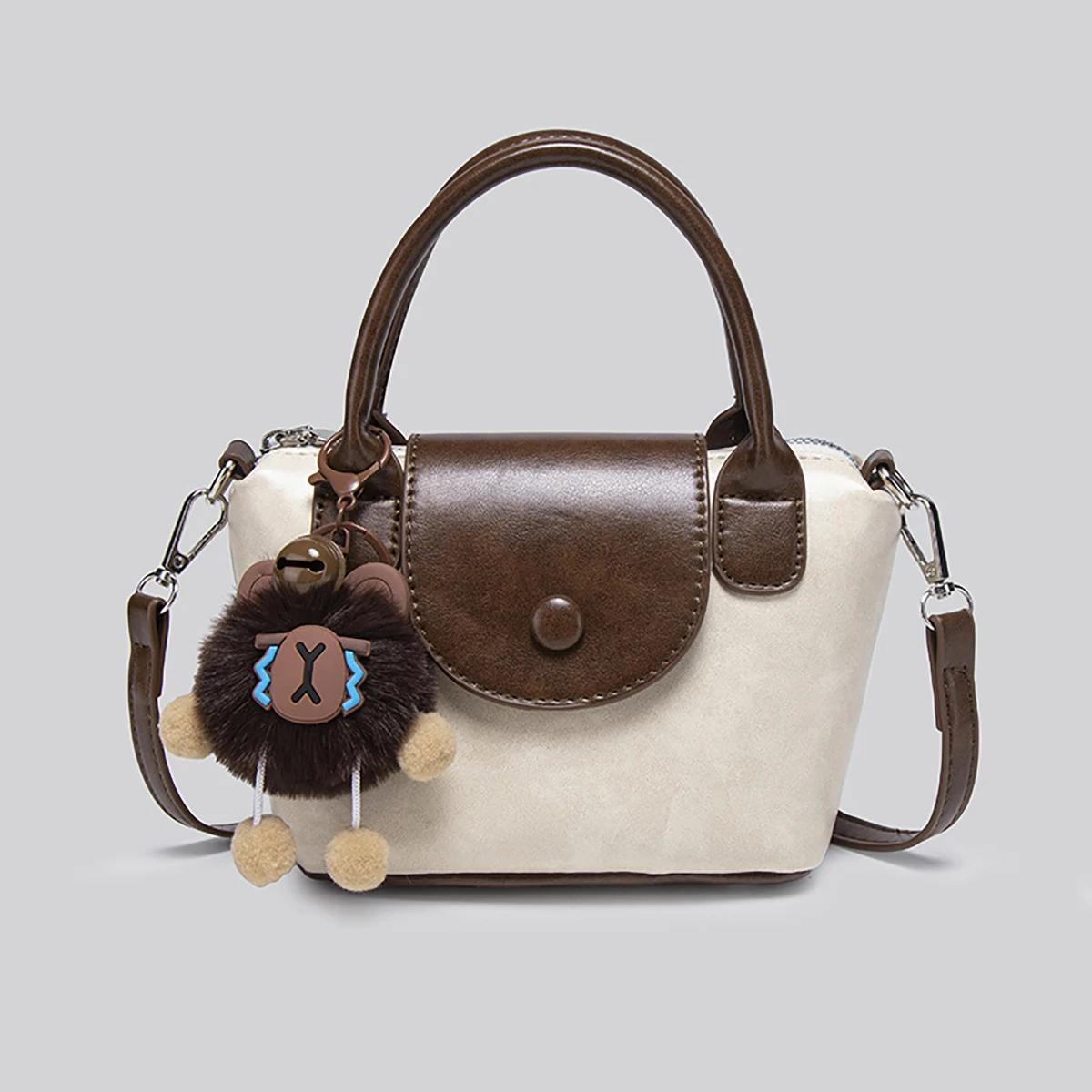 Tas mini patchwork PU, tas selempang wanita, tas kotak kecil untuk bepergian, dengan liontin boneka dan bola bulu