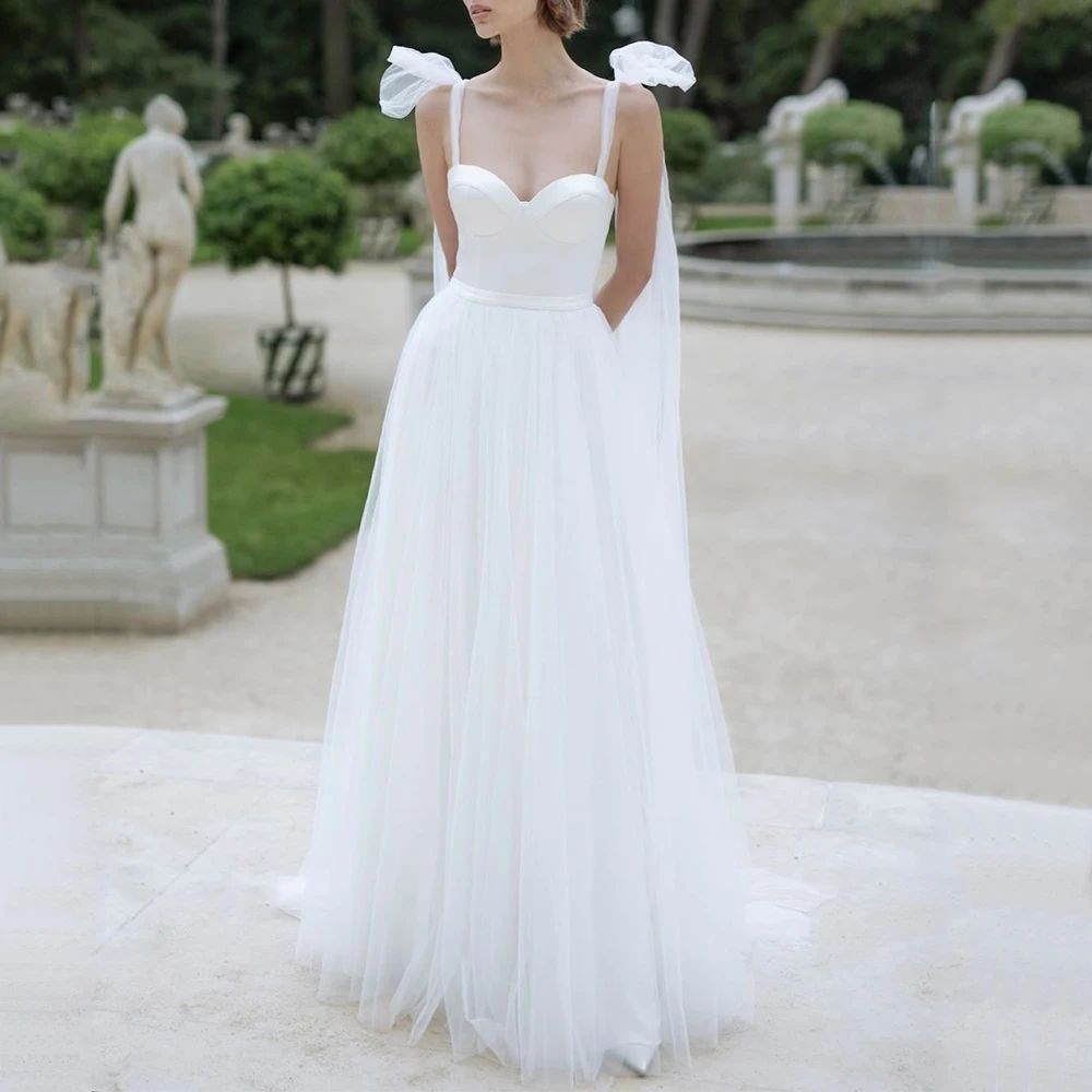Elegant Spaghetti Straps Tulle Wedding Dress Sweetheart A-Line Floor Length Sleeveless with Bow Open Back Bridal Gowns Robe