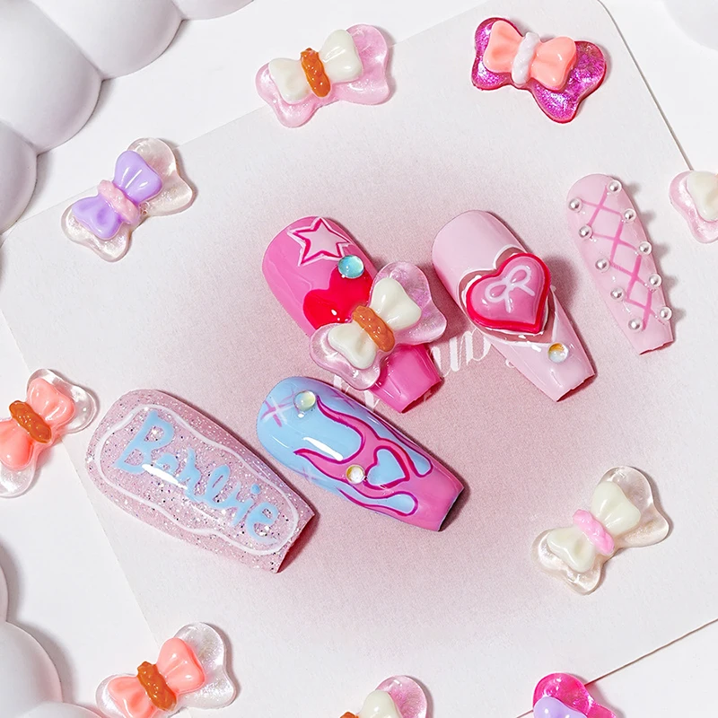 โบว์เรซิ่นผสม10ชิ้น/ถุงการตกแต่งศิลปะเล็บอะคริลิก3D เสน่ห์น่ารักชิ้นส่วนอุปกรณ์ทำเล็บพลอยเทียม DIY โบว์สีสันสดใส