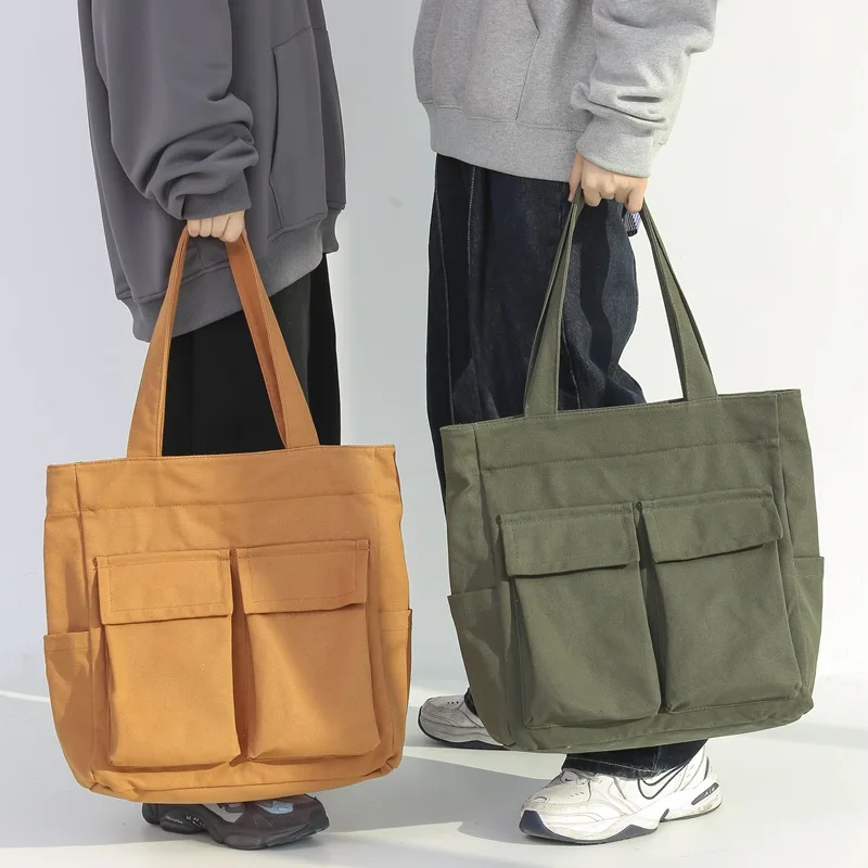 Retro canvas baglarge-capacity portable shoulder bag men's and women's leisure travel bagKorean version ins tooling wind totebag