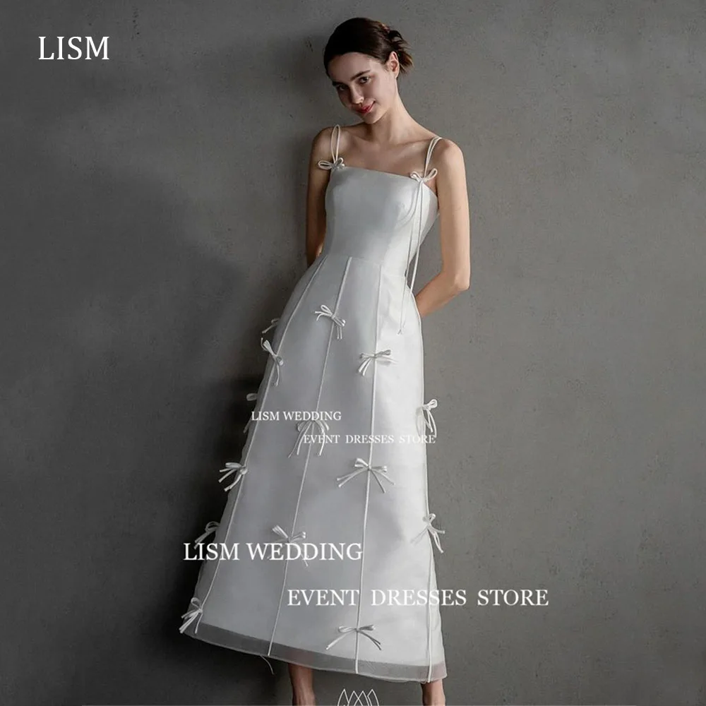 LISM Boat Neck Satin Wedding Dresses Spaghetti Straps Backless Bride Gowns 2025 Simple Bow Floor Custom Size Bridal Party Dress