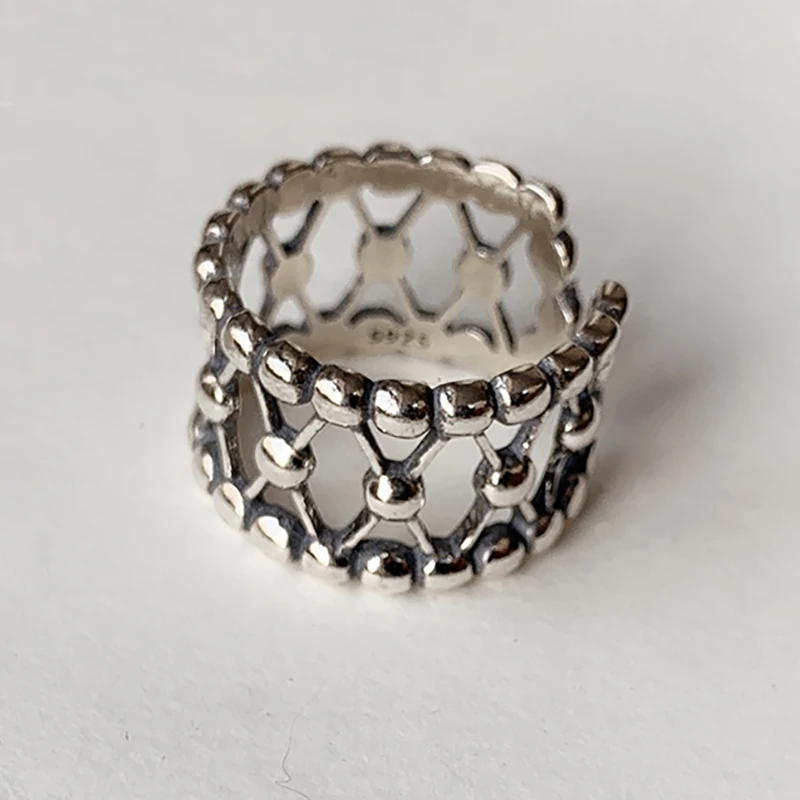 Exquisite Silver-Plated Filigree Ring With Intricate Openwork Design And Scalloped Edge Jewelry