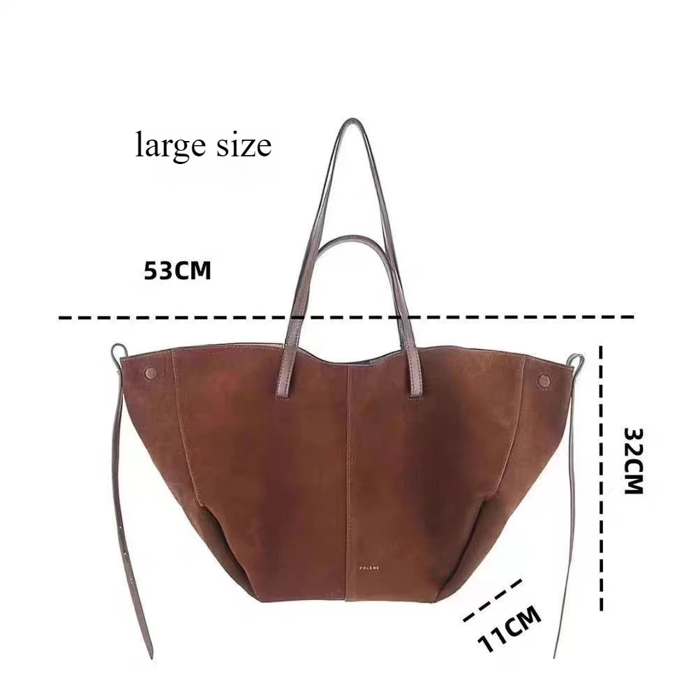 กระเป๋าถือทรงปีกแบบด้าน ดีไซน์ฝรั่งเศสสไตล์ Y2K ปี 2025  วัสดุหนังกลับ  ความจุเยอะ สะพายไหล่หรือถือใต้วงแขนได้