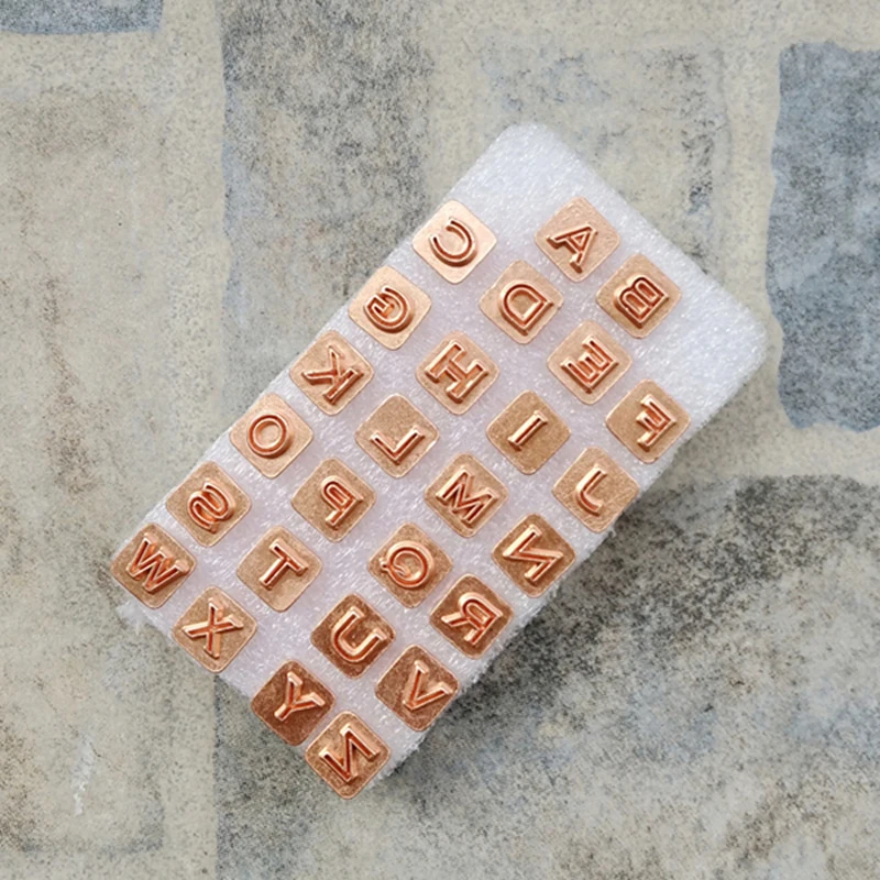 

Leather Letter Stamp Set 26 Pcs, 7mm Outline Alphabet Punch for Personalizing, with Free Holder Rod