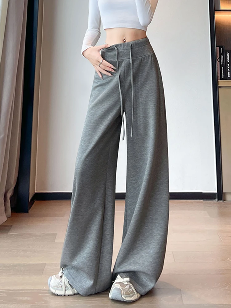 Koreańskie spodnie sportowe typu stringi z wysokim stanem, damskie, jesienne, nowe, jednokolorowe, zwiewne, z szerokimi nogawkami, uniwersalne, wyszczuplające.