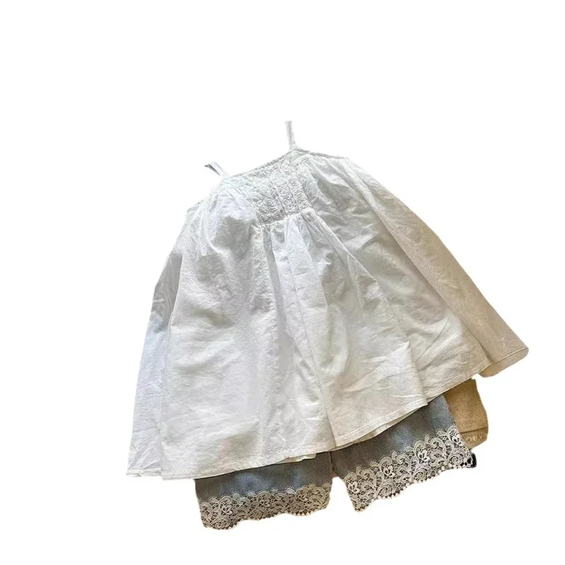 Ropa para niños, vestido Halter holgado dulce a la moda de encaje, novedad de verano 2025, vestido Halter sencillo en blanco y negro para niñas de estilo coreano