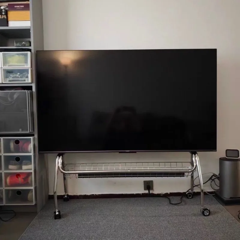 Multifunktionaler TV-Ständer aus Edelstahl mit Aufbewahrungskorb, moderner, einfacher nordischer mobiler TV-Wagen für den Heimgebrauch von 32–60 Zoll großen Fernsehern
