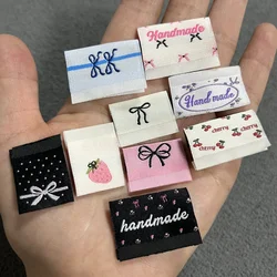 Spot folding  side label, bow handmade clothing woven label，handmade sewing DIY accessories