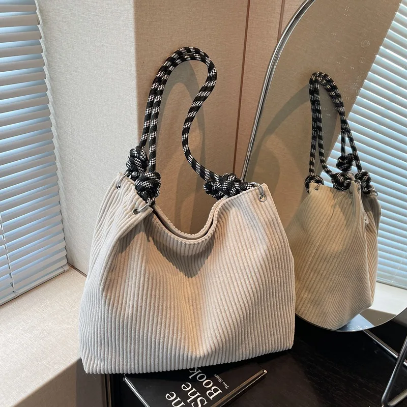 

New Korean Winter Corduroy Shoulder Bag Large Capacity Retro Striped Solid Color Travel Bag Simple and Light Texture Handle Bag