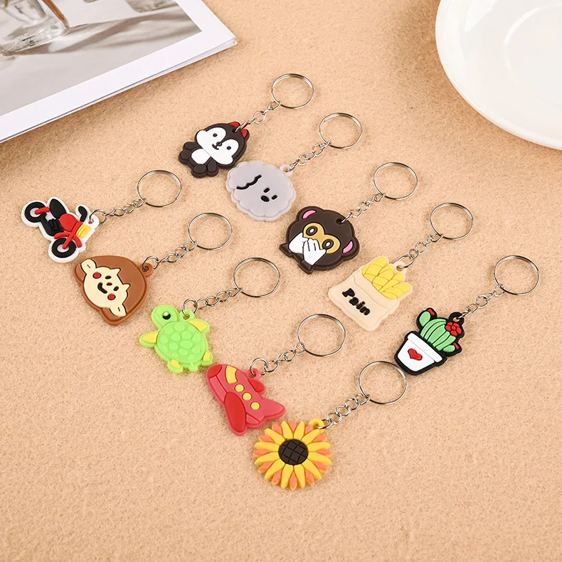 100pcs Cute Keychain for Kids Teacher Party Favor Cute Anime Little Keyrings Wholesale Cheap Festival Pendants Gift Charms Sets