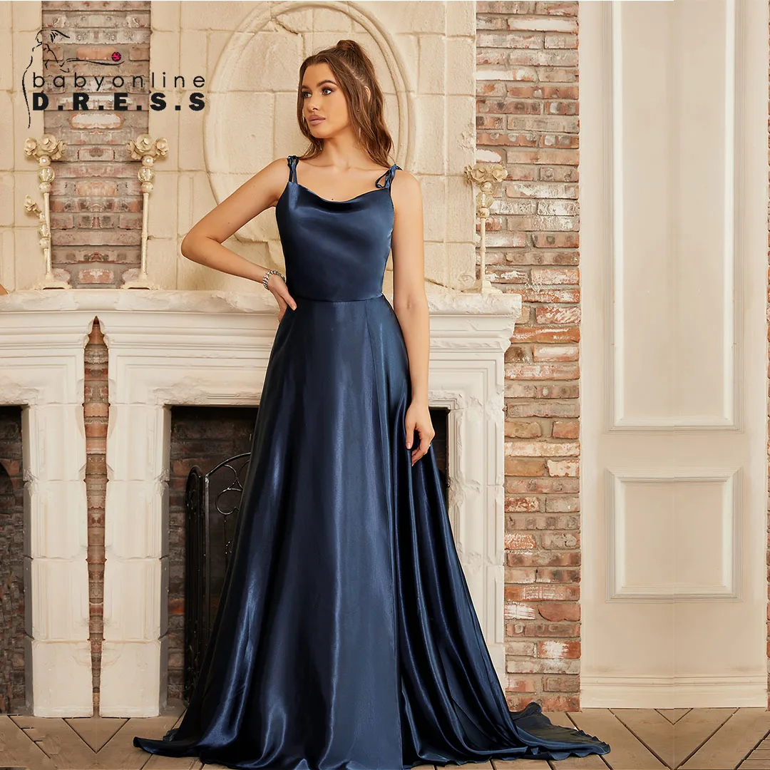 

Свадебное платье BABYONLINE с вырезом-кауол, открытой спиной с завязками, тонкими бретелями-спагетти, разрезом на бедре и струящейся юбкой А-силуэта для подружек невесты